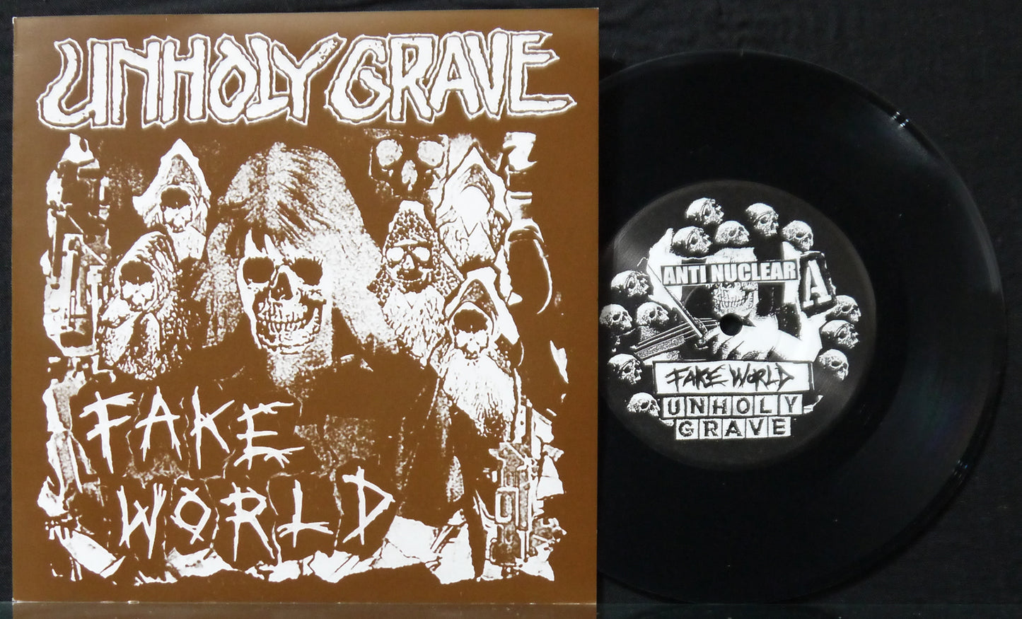 UNHOLY GRAVE - Fake World 7"