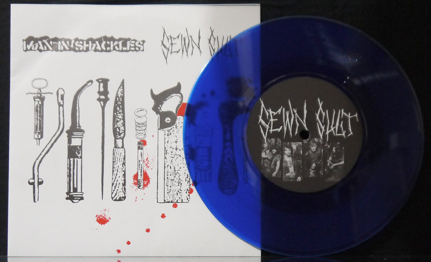 SEWN SHUT / MAN IN SHACKLES - Split 7"