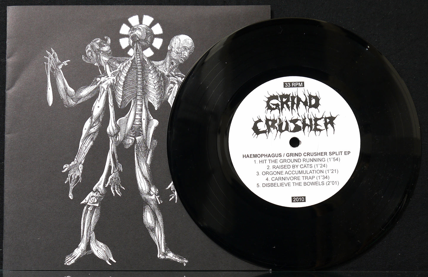 GRIND CRUSHER / HAEMOPHAGUS - Split 7"