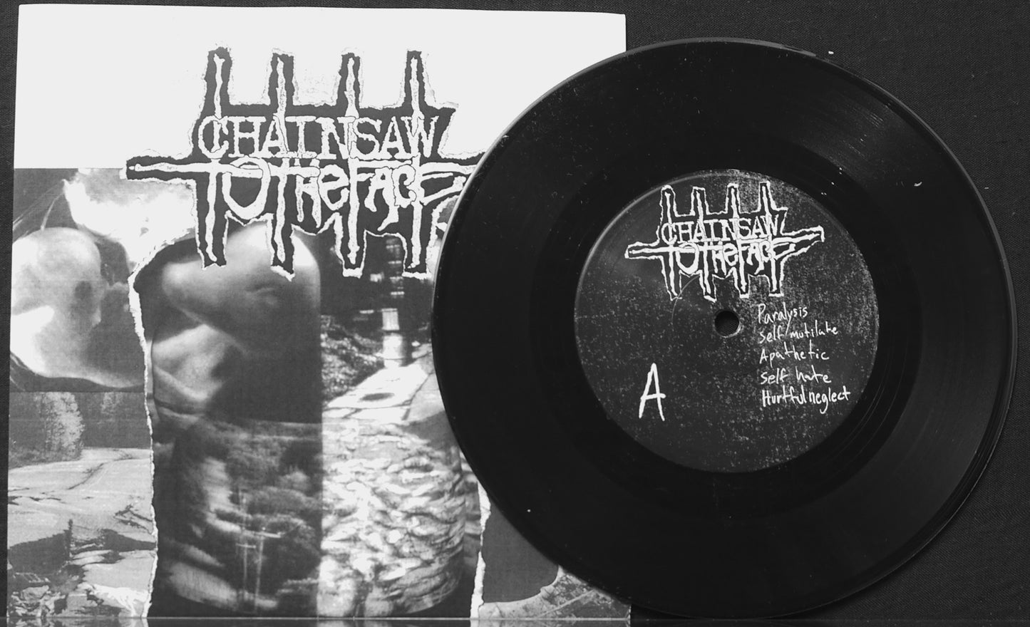 CHAINSAW TO THE FACE - Plague Worship 7"