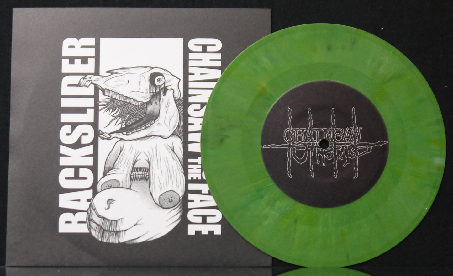 CHAINSAW TO THE FACE / BACKSLIDER - Split 7"