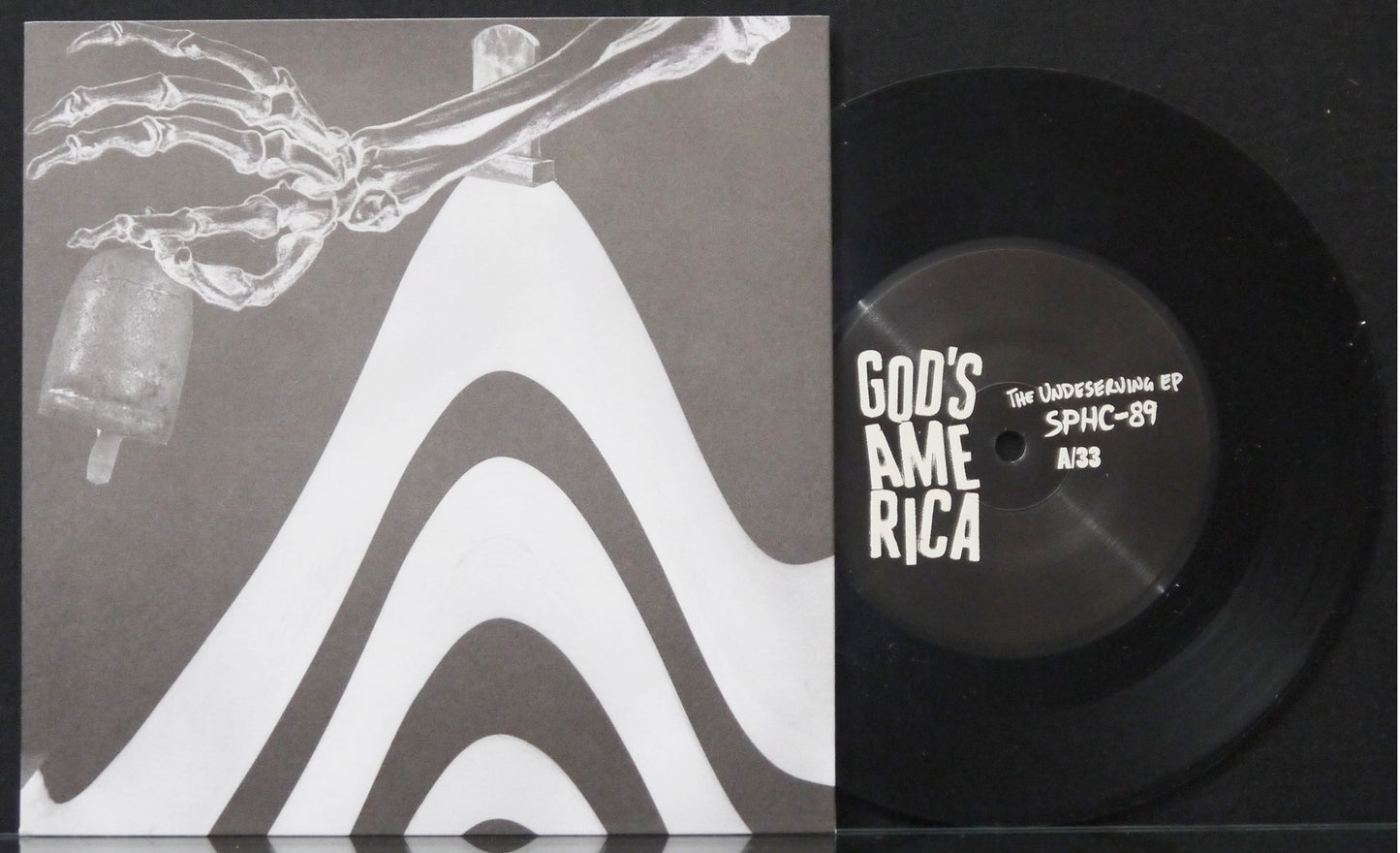 GOD'S AMERICA - The Undeserving 7"